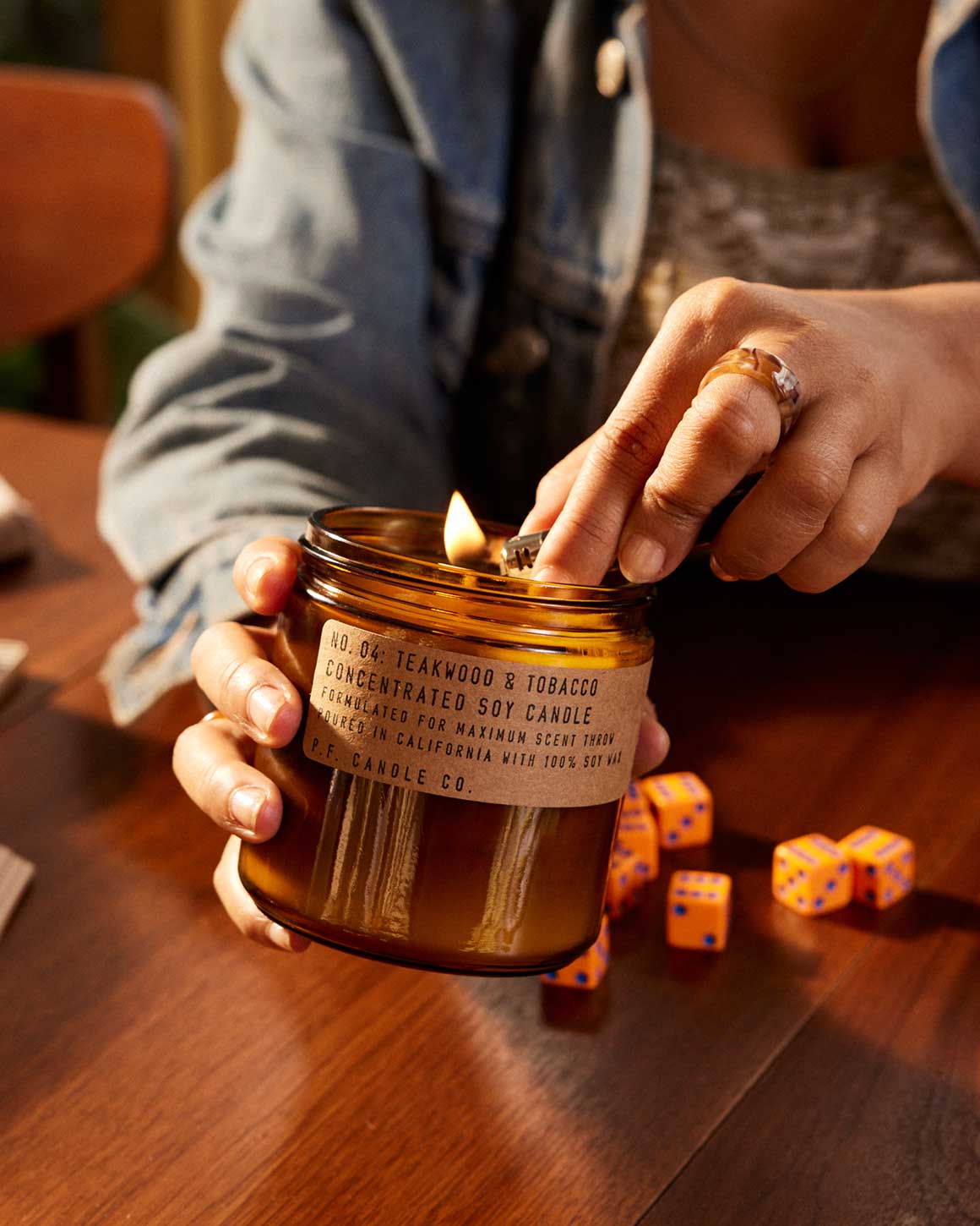 tobacco teak candle & Teakwood Teakwood + Tobacco has a spicy top scent combines with sandalwood and musk to give a rich scent that compliments your modern style P.F. Candle Co. Teakwood &
